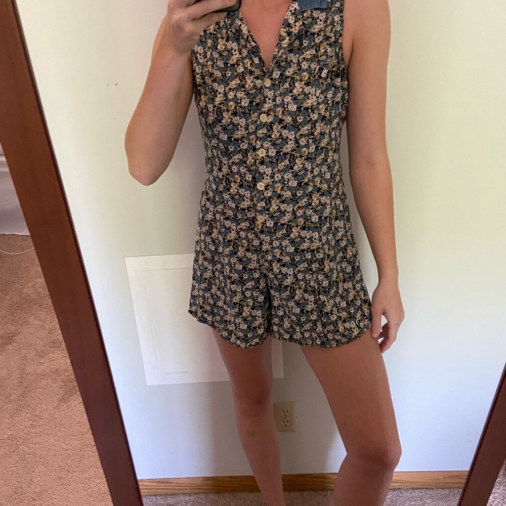 Jonathan Martin denim collared floral button up romper with a tie for the back